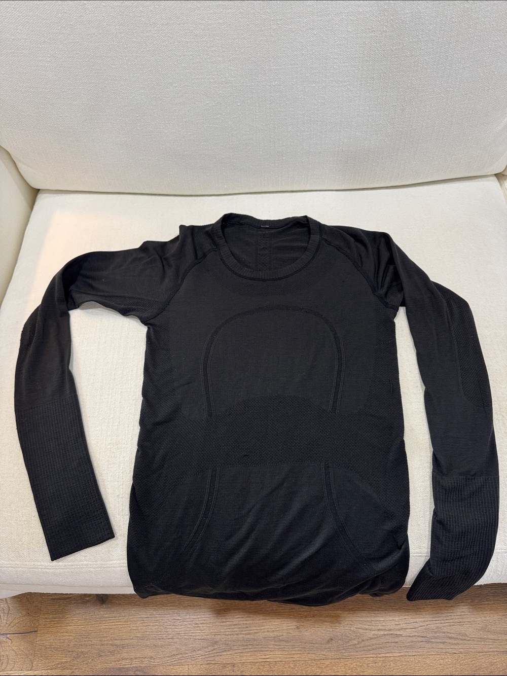 Lululemon (Size 6) Tag Cut Out Black Long Sleeve Seamless Active Top
